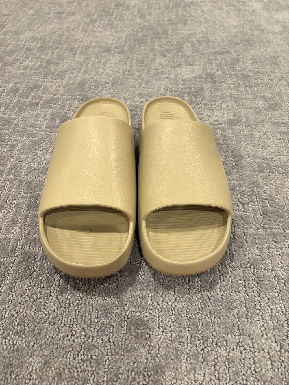 Nike Men's Calm Slides
Sandals in Beige